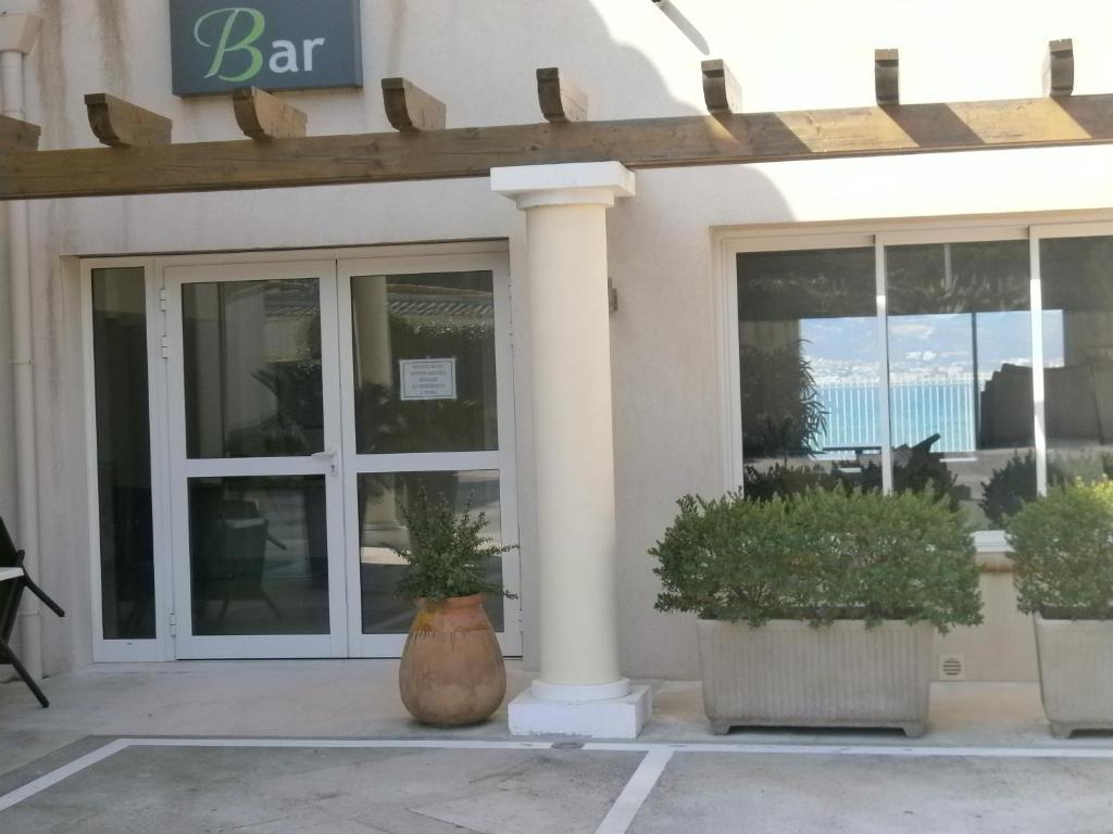 Au Tapis De Sable Hotell Saint-Cyr-sur-Mer Eksteriør bilde